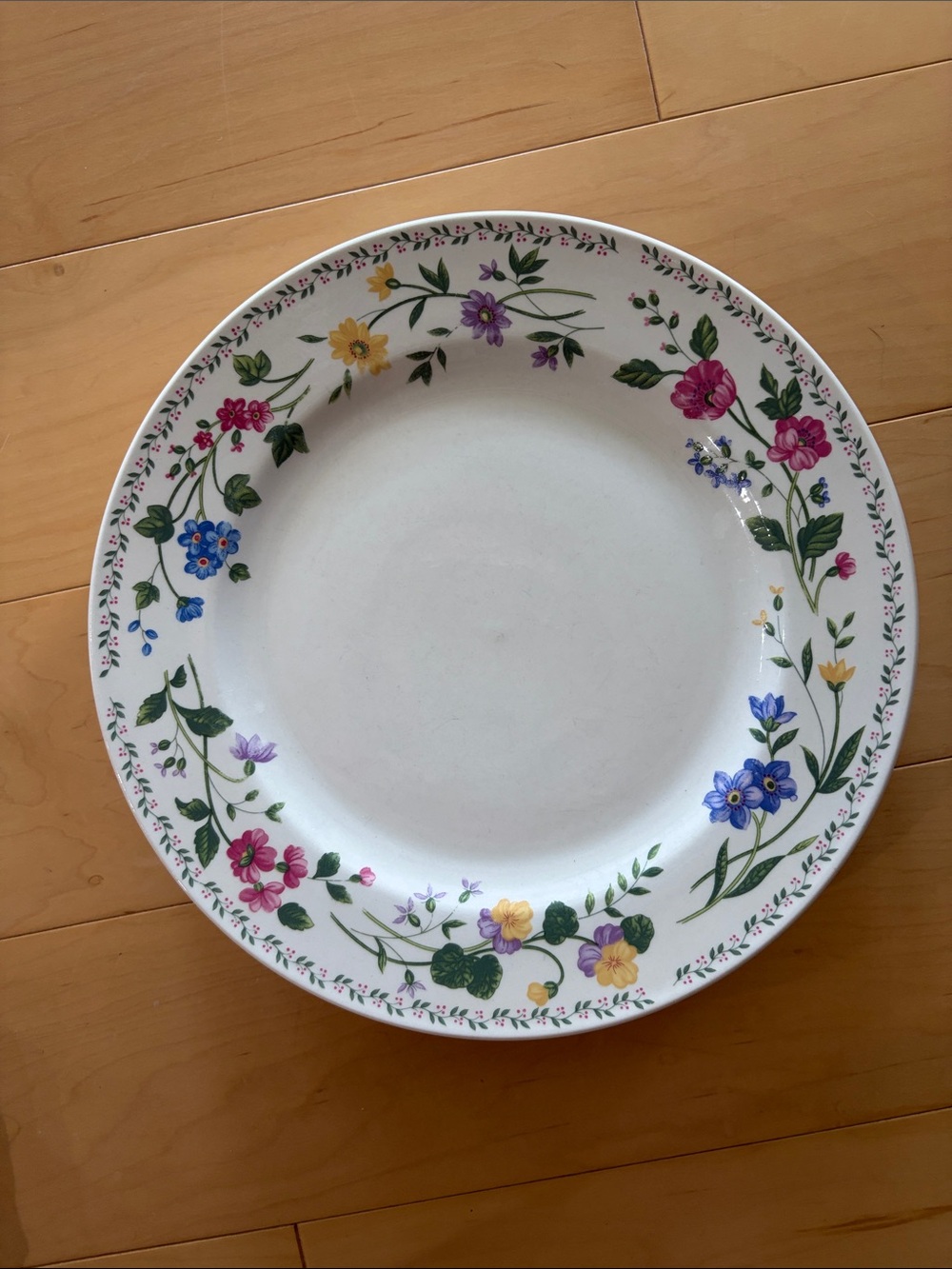 Farberware White Dinner Plate with Pink, Blue, Yellow & Purple Floral Border